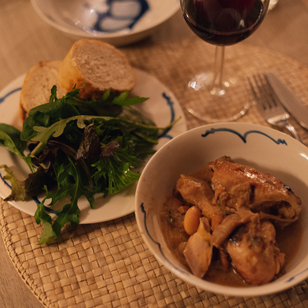 Rosemary chicken served with salad and fresh bread